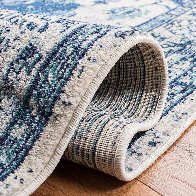 SAFAVIEH Monaco Collection Area Rug - 8' x 10', Ivory & Blue, Non-Shedding & Easy to Clean, Distressed Medallion Design, Ideal for Living Room, Bedroom, Dining Space (MNC243A)