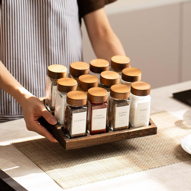 Yangbaga 24Pcs Glass Spice Jars with Labels-4oz Acacia Wood Lid Square Spice Containers and 2pcs Rack with Pepper Grinder Lids &Funnel,Seasoning Jars for Rack Cabinet Drawer