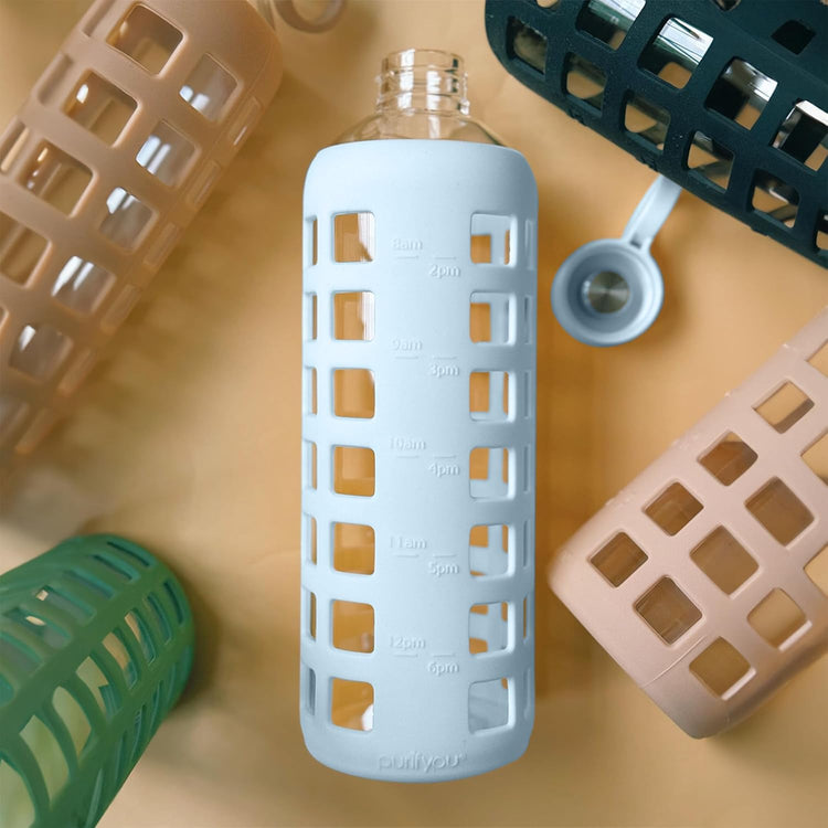 purifyou 40oz / 32oz / 22oz / 12oz Borosilicate Glass Water Bottle with Time & Volume Markers, Silicone Sleeve, Stainless Steel Lid – Reusable Glass Bottle for Water & Juice (40oz Ice Blue)