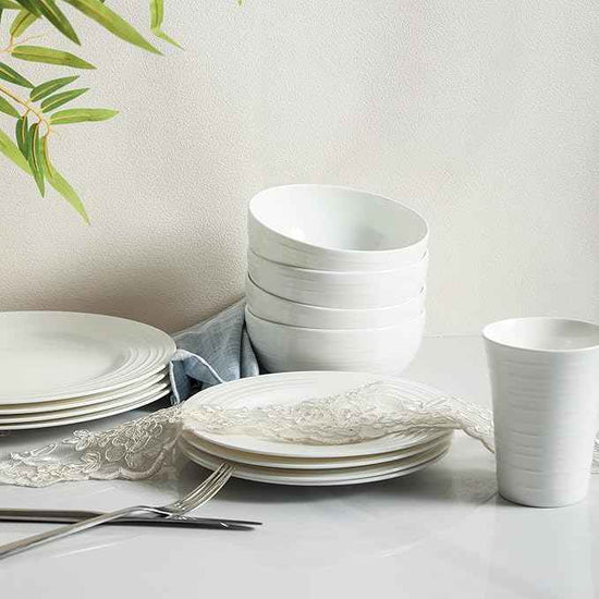 Stone Lain Eleanor Bone China 16 Piece Dinnerware, Plates and Bowls for 4, White Dish Collection with Mugs, Elegant Swirl Design, Microwave & Dishwasher Safe