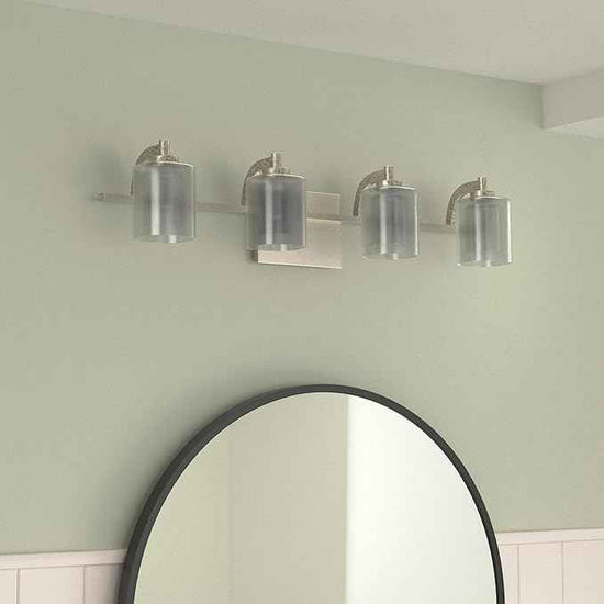 Quoizel Kolt Modern Vanity Lights, 4-Light, 29 Inch Brushed Nickel Bathroom Lighting Fixtures Over Mirror, Sandblasted Inner Glass, 50 W LED Bulb, Wall Mount Light for Bathrooms, Kitchen or Hallway