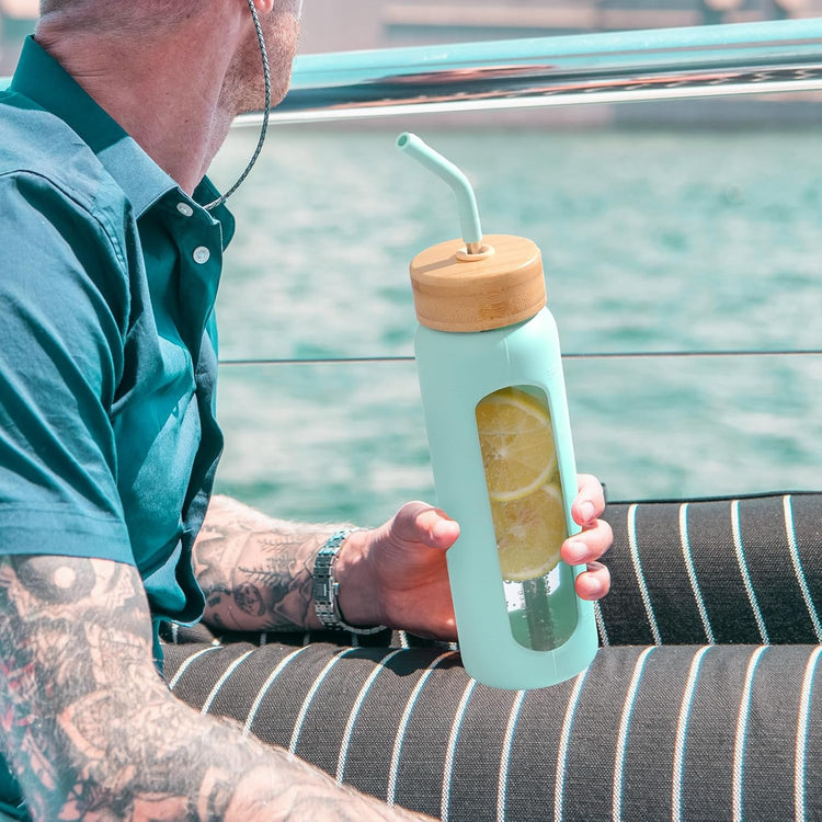 Glass Water Bottle with Straw, 24oz Glass Drinking Bottle with 2 Lids-Bamboo and Spout Lid with Phone Holder Handle for Gym Sports,with Silicone Sleeve and Time Marker,Mint Green