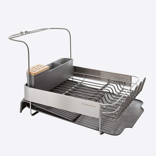KitchenAid Compact to Full Size Expandable, Rust Resistant Satin Coated Dish Rack with Angled Self Draining Drain Board and Removable Flatware Caddy, 24-Inch, Charcoal