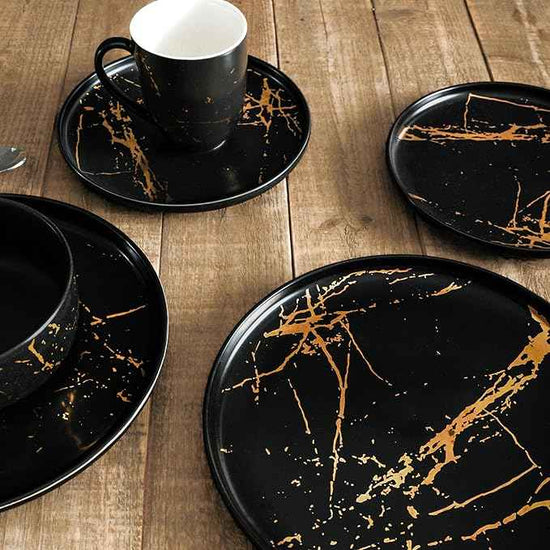 Stone Lain Porcelain 16 Piece Dinnerware set, 4 Full Black Gold Splash Sets